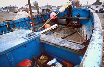 Comp image : boat0116 : Orange floats in a blue painted fishing boat on the shore at Aldeburgh, Suffolk, England