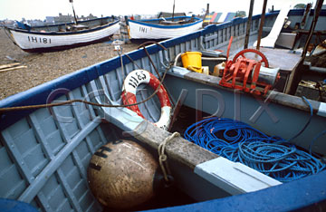 Comp image : boat0122 : Ropes and tackle in a blue painted fishing boat on the shore at Aldeburgh, Suffolk, England