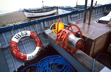Comp image : boat0123 : Ropes and tackle in a blue painted fishing boat on the shore at Aldeburgh, Suffolk, England