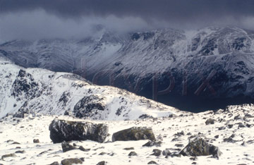 Comp image : ld02018 : Looking across Buttermere valley from High Stile, in the Lake District, with snow underfoot and a heavy sky