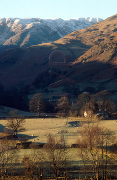 Comp image : ld02321 : Looking across trees in Patterdale valley to Deepdale and snow-covered Rydal Head, in the English Lake District
