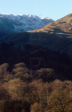 Comp image : ld02322 : Looking across trees in Patterdale valley to Deepdale and snow-covered Rydal Head, in the English Lake District