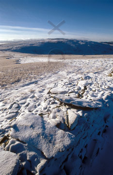 Comp image : ld02415 : Snow covers a stone wall on High Street, east of Hartsop, in the English Lake District. Thornethwaite Crag under a blue sky in the distance.