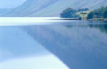 Comp image : ld05306 : Delicate autumn reflection of the English Lake District fells in the still surface of Crummock Water, near Buttermere