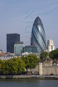 Comp image : lond010023 : Buildings old and new: Sir Norman Foster's 'gherkin' and the historic Tower of London seen from the south bank of the River Thames in London, England