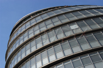 Comp image : lond010027 : Dramatic shapes of City Hall, London, against the sky. Building designed by Foster and Partners, and home to the Greater London Authority.