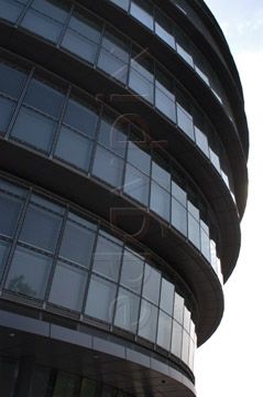 Comp image : lond010035 : Dramatic shapes of City Hall, London, against the sky. Building designed by Foster and Partners, and home to the Greater London Authority.