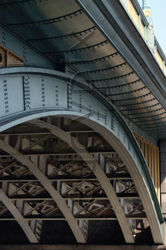 Comp image : lond010079 : Strength of the massive but intricate structure of an arch of Southwark Bridge over the River Thames in London, England