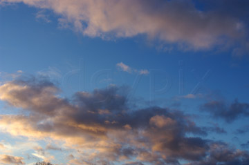 Comp image : sky020849 : Two bands of pink tinted clouds against a blue evening sky