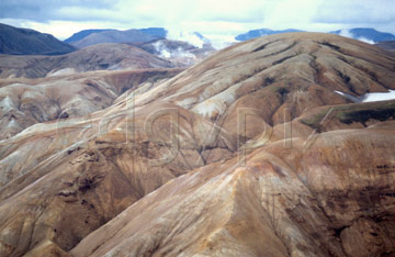 Comp image : torf0623 : Ryolite landscape in southern Iceland. Laid down by volcanic activity, eroded into patterns by snow-melt