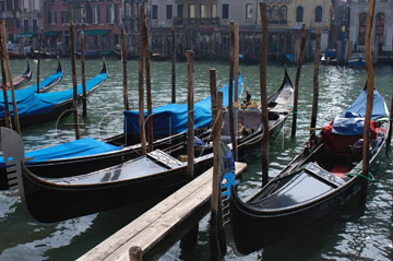 Comp image : ven021295 : Gondolas moored in strong sunshine on the Grand Canal [Canal Grande] in Venice, Italy