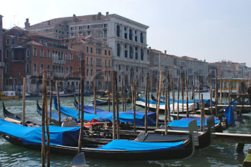 Comp image : ven021299 : Looking across the Grand Canal [Canal Grande] to the Palazzo Farsetti in Venice, Italy, with gondolas moored in the foreground