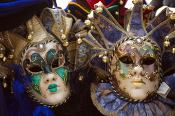 Comp image : ven021348 : Two extravagantly decorated Carnivale masks on sale in Venice, Italy