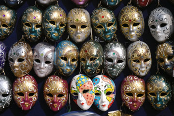 Comp image : ven021358 : An arrangement of brightly decorated Carnivale masks on sale in Venice, Italy, makes a colourful pattern