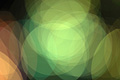 Bright abstract photo with overlapping green and orange circles Bright abstract photo with overlapping green and orange circles
