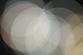 Bright abstract photo with overlapping white and cream translucent circles Bright abstract photo with overlapping white and cream translucent circles