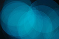 Bright abstract photo with overlapping blue translucent circles