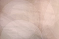 Light abstract photo with overlapping creamy-white translucent circles and ghostly shapes Light abstract photo with overlapping creamy-white translucent circles and ghostly shapes