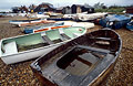 Tired old boats on the shingle on the Suffolk shore