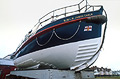 The old Aldeburgh RNLI lifeboat on its carriage; Aldeburgh, Suffolk, England