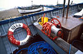 Ropes and tackle in a blue painted fishing boat on the shore at Aldeburgh, Suffolk, England