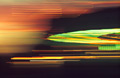 Strongly blurred lights of a fairground ride at night Strongly blurred lights of a fairground ride at night