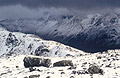 Looking across Buttermere valley from High Stile, in the Lake District, with snow underfoot and a heavy sky