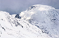 Green Gable and Windy Gap under snow, seen from Sprinkling Tarn in the English lake District