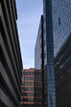 Dramatic view to the sky between two modern London buildings