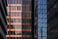 Shapes, patterns and reflections of parts of modern buildings in London, England