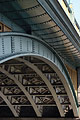Strength of the massive but intricate structure of an arch of Southwark Bridge over the River Thames in London, England