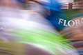 A strong blur of runners in the London Marathon, with part of the sponsor's (Flora) roadside advertisement in the background A strong blur of runners in the London Marathon, with part of the sponsor's (Flora) roadside advertisement in the background